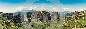 Aerial view, wide panoramic shot of known Greek rock formations and monasteries on the top. Meteora, Greece. Beautiful