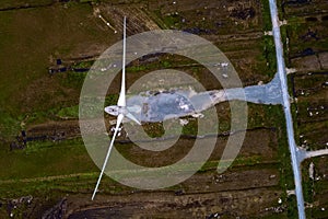 Aerial view on a wind electricity generator in a turf field in Connemara, county Galway, Ireland. Production of clean renewable