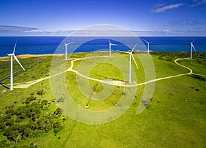 Aerial view of a wind farm and ocean in Australia.