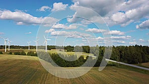 Aerial View of Wind Farm or Wind Park, With High Wind Turbines for Generation Electricity. Green Energy Concept