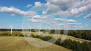 Aerial View of Wind Farm or Wind Park, With High Wind Turbines for Generation Electricity. Green Energy Concept