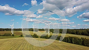 Aerial View of Wind Farm or Wind Park, With High Wind Turbines for Generation Electricity. Green Energy Concept