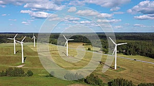 Aerial View of Wind Farm or Wind Park, With High Wind Turbines for Generation Electricity. Green Energy Concept