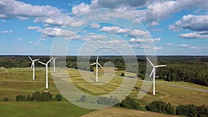 Aerial View of Wind Farm or Wind Park, With High Wind Turbines for Generation Electricity. Green Energy Concept