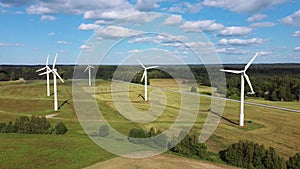 Aerial View of Wind Farm or Wind Park, With High Wind Turbines for Generation Electricity. Green Energy Concept