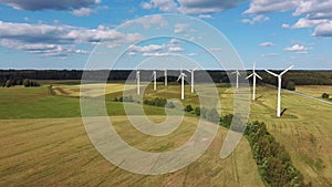 Aerial View of Wind Farm or Wind Park, With High Wind Turbines for Generation Electricity. Green Energy Concept