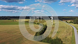 Aerial View of Wind Farm or Wind Park, With High Wind Turbines for Generation Electricity. Green Energy Concept