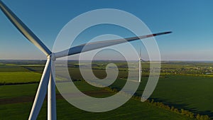 Aerial view of wind turbine park generating environmental friendly energy.