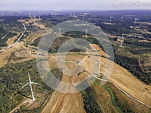 Aerial view of a wind turbines in the countryside near Monte Rubio in Faro district, Alentejo region, Portugal photo