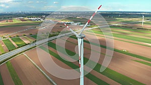 Aerial view of Wind Turbines Farm in Field. Austria. Drone view on Energy Production