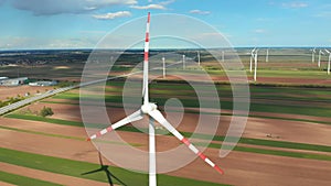 Aerial view of Wind Turbines Farm in Field. Austria. Drone view on Energy Production