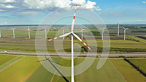 Aerial view of Wind Turbines Farm in Field. Austria. Drone view on Energy Production