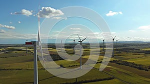 Aerial view of wind turbines farm in field. Austria. drone view on energy production