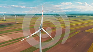 Aerial view of Wind Turbines Farm in Field. Austria. Drone view on Energy Production