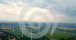 Aerial view of wind turbines field energy industrial landscape