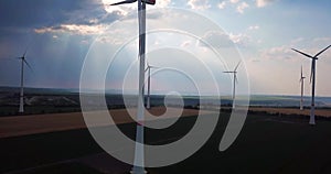 Aerial view of wind turbines field energy industrial landscape