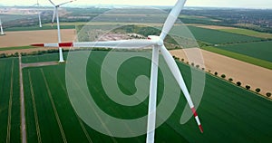Aerial view of wind turbines field energy industrial landscape