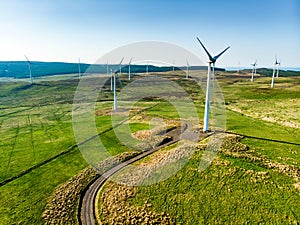 Aerial view of wind turbines generating power, located in Connemara region, County Galway, Ireland