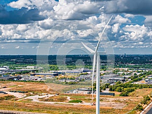 Aerial view of the wind turbines. Green ecological power energy generation. Wind farm eco field.