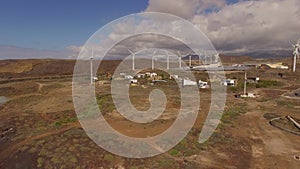 Aerial view of wind turbines producing clean sustainable energy