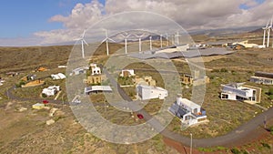 Aerial view of wind turbines producing clean sustainable energy