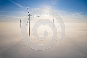 Aerial view of windfarm during winter morning