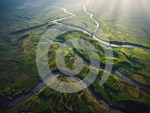 Aerial View of a Winding River Through Farmland