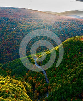Aerial view of a winding road in the Catskill Mountains of the USA in autumn