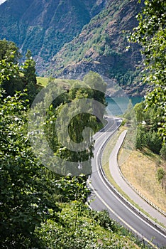 aerial view of winding road green trees and beautiful mountains Aurlandsfjord Flam