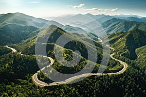 Aerial view of winding road in the mountains. Top view of mountain road, A bird\'s-eye view of a winding asphalt road