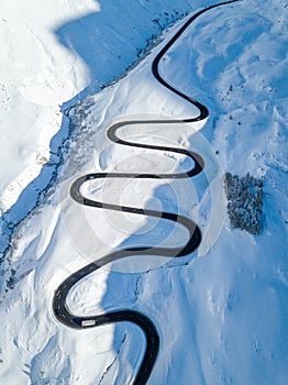 Aerial view of the winding road over the Julier Pass in Swiss Alps