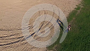 Aerial view of Wing Chun on a coast between trainer and boy