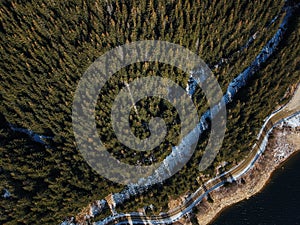 Aerial view of the winter background with a snow covered forest