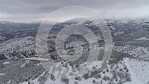 Aerial view of winter mountains, winter landscape. Shot. Majestic snow mountains, Aerial view of the snow covered