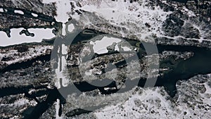 Aerial view of the winter river in Kyiv city. Drone aerial view