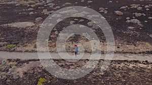 Aerial view of woman runnning along the nature reserve. Healthy active lifestyle