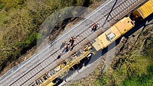 Aerial view of workers on a railway construction site