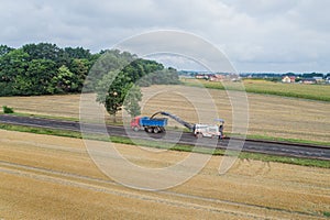 Aerial view on working asphalt scrapping machine