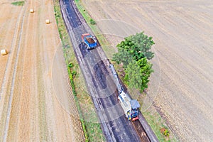 Aerial view on working asphalt scrapping machine