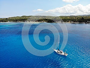 Aerial View of Yacht in front of Siquijor Island, The Philippines