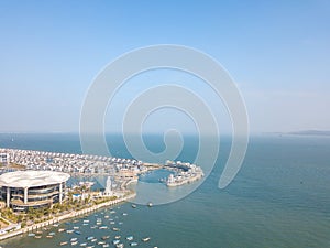 Aerial view of the Yacht Terminal, Xiamen Xiangshan Yacht Club in Xiamen city. Xiamen city architecture on the coastline in Fujian