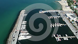 Aerial view of yachts anchored in port. Yacht harbor and sail boats