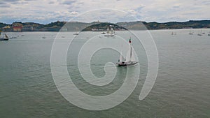 Aerial view yachts sailing at cloudy marine landscape. Many ships floating ocean