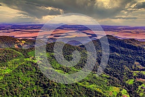 Aerial view of the Ybytyruzu Mountains with the flat plain below in Paraguay from a height of 500 meters photo
