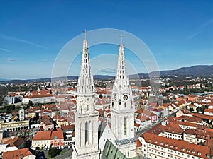 Aerial view of Zagreb City featuring two prominent steeples perched atop its skyline