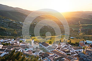 Aerial view of Zahara at sunset with Chapel of San Juan de Letran - Zahara de la Sierra, Andalusia, Spain photo