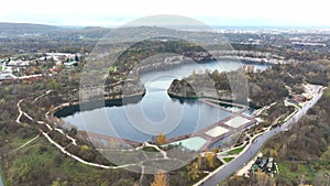 Aerial View of Zakrzowek Lake in Autumn, Scenic aerial view of Zakrzowek Lake surrounded by autumn foliage and limestone