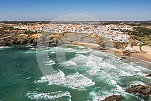 Aerial view of Zambujeira do Mar - charming town on cliffs by the Atlantic Ocean in Portugal photo