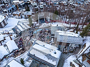 Aerial View on Zermatt Valley and luxury hotel with people partying