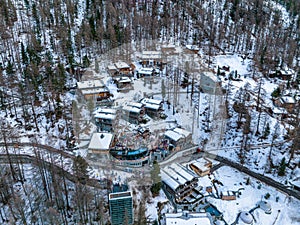 Aerial View on Zermatt Valley and luxury hotel with people partying